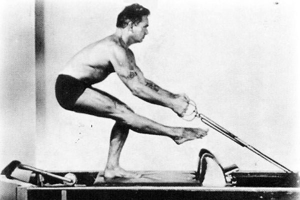 Original photo of Joseph Pilates on the reformer